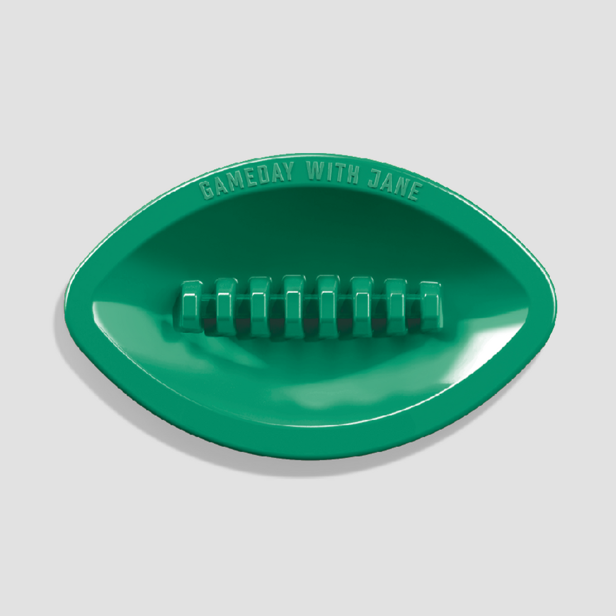 Jane West Gameday With Jane football ashtray in green — top view with laces detail