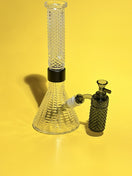 Switch Jane West x Prism Midnight Smoke 14mm 90 degree ash catcher attached to a glass water pipe 2 image