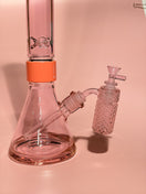 Switch Jane West x Prism Pink Lemonade 14mm 90 degree ash catcher attached to a glass water pipe 3 image